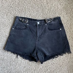 Black distressed jean shorts